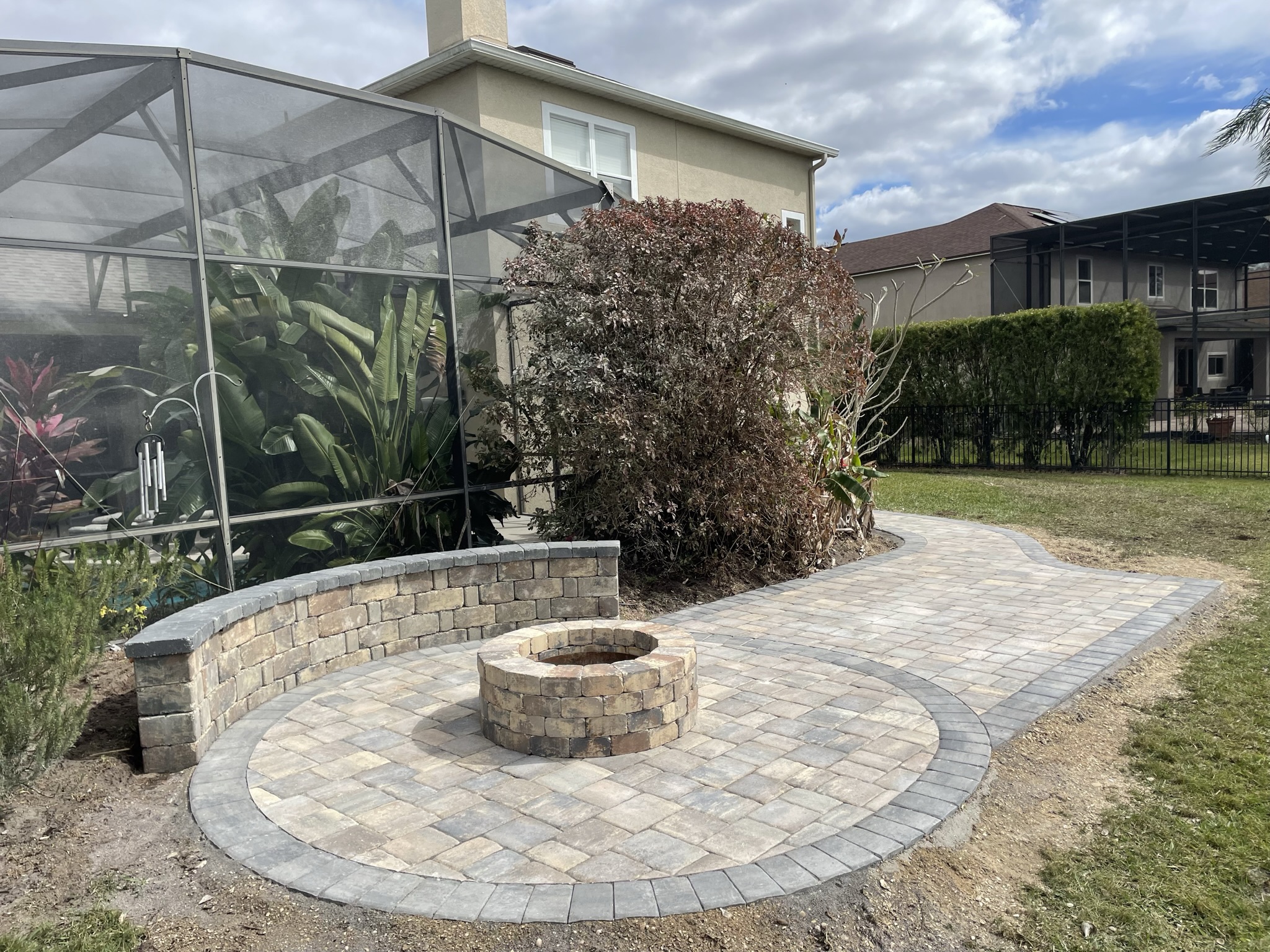 Leading Brick Paving Company in Cocoa Beach installing a durable, stylish paver driveway